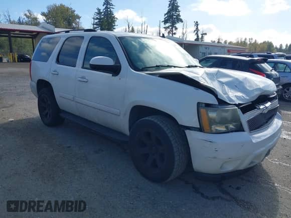 2007 Chevrolet Tahoe LTZ with VIN 1GNFK13077J118645, listed as a IAAI auction lot 43405160 with 196,940 mi miles and . Bid and sale history available at DreamBid. Image 1.
