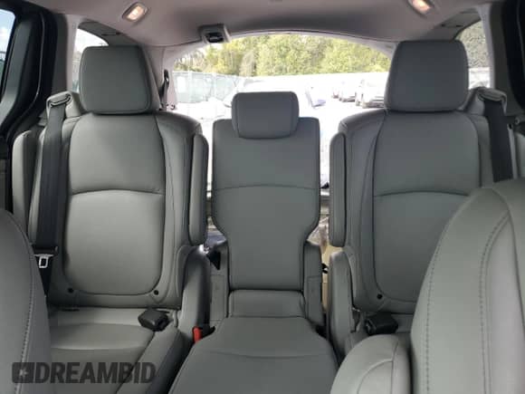 2023 Honda Odyssey Touring с VIN 5FNRL6H81PB014478, выставлен на аукционе Copart как лот 84063555 с пробегом 61 363 миль миль и Списание • Salvage title. История ставок и продаж доступна на DreamBid. Изображение 10.