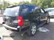 2009 Chevrolet Tahoe 2LT z VIN 1GNFK23069R218147, wystawiony jako IAAI lot #43225897 z przebiegiem 214 764 mil mil oraz . Historia ofert i sprzedaży dostępna na DreamBid. Obrazek 4.
