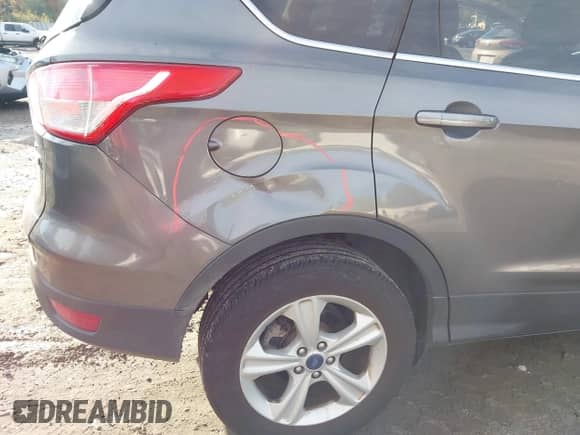 2014 Ford Escape SE z VIN 1FMCU0GX7EUB37811, wystawiony jako IAAI lot #43461605 z przebiegiem 120 167 mil mil oraz . Historia ofert i sprzedaży dostępna na DreamBid. Obrazek 6.