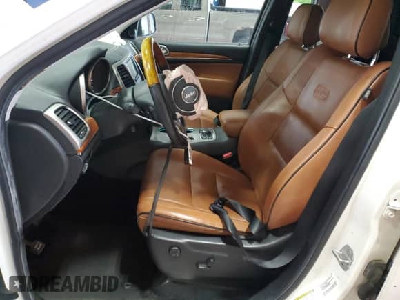 2012 Jeep Grand Cherokee Overland z VIN 1C4RJFCGXCC272414, wystawiony jako Copart lot #80581065 z przebiegiem 135 293 mil mil oraz Szkoda całkowita • Salvage title. Historia ofert i sprzedaży dostępna na DreamBid. Obrazek 7.