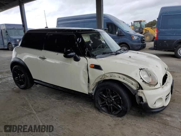 2013 MINI Hardtop with VIN WMWSU3C51DT691076, listed as a Copart auction lot 48066455 with 143,002 mi miles and Salvage title. Bid and sale history available at DreamBid. Image 4.