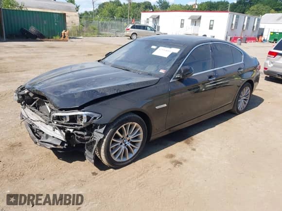 2015 BMW 5 Series 528i xDrive with VIN WBA5A7C52FD620771, listed as a IAAI auction lot 42953855 with 151,283 mi miles and . Bid and sale history available at DreamBid. Image 2.