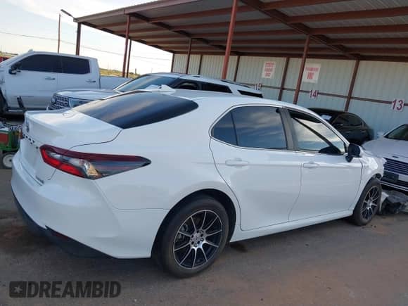 2021 Toyota Camry Hybrid LE with VIN 4T1C31AK3MU560440, listed as a IAAI auction lot 43202632 with 65,038 mi miles and . Bid and sale history available at DreamBid. Image 13.