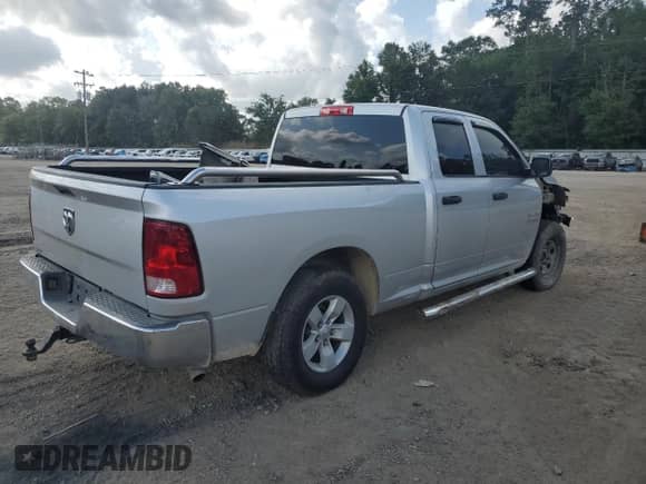 2018 Ram 1500 Express with VIN 1C6RR6FG7JS148583, listed as a Copart auction lot 60063055 with 178,947 mi miles and Salvage title. Bid and sale history available at DreamBid. Image 3.