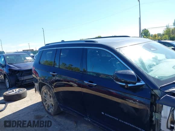 2021 Jeep Grand Cherokee Overland with VIN 1C4RJKDG5M8166335, listed as a IAAI auction lot 43313945 with 45,936 mi miles and . Bid and sale history available at DreamBid. Image 14.