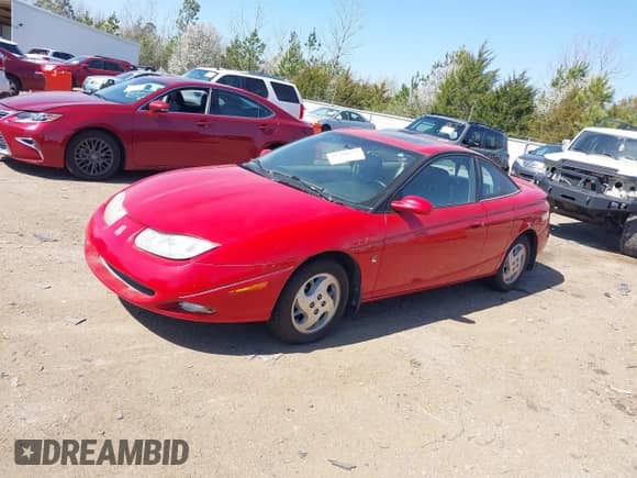 2002 Saturn SC with VIN 1G8ZY12792Z127824, listed as a IAAI auction lot 41760132 with 80,908 mi miles and . Bid and sale history available at DreamBid. Image 2.