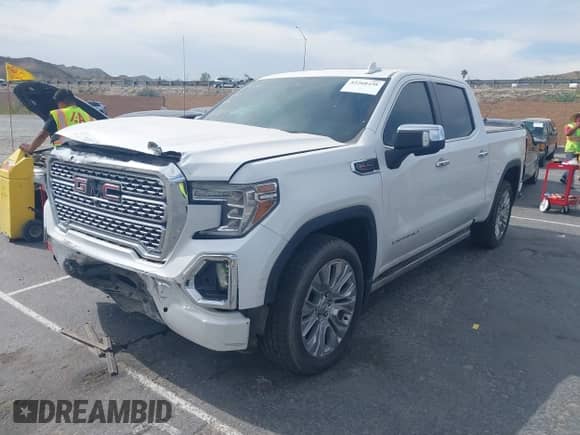 2021 GMC Sierra 1500 Denali with VIN 3GTU9FEL1MG349215, listed as a IAAI auction lot 42268438 with 97,465 mi miles and . Bid and sale history available at DreamBid. Image 17.