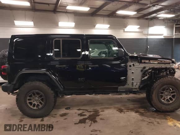 2022 Jeep Wrangler Unlimited Rubicon 392 с VIN 1C4JJXSJXNW114821, выставлен на аукционе IAAI как лот 41949305 с пробегом 10 225 миль миль и . История ставок и продаж доступна на DreamBid. Изображение 14.