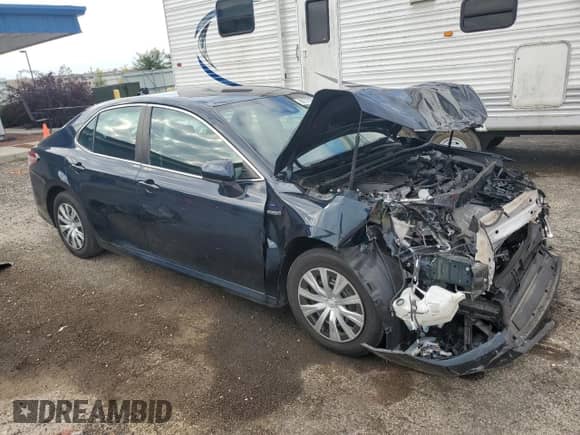 2019 Toyota Camry Hybrid LE с VIN 4T1B31HK1KU509422, выставлен на аукционе Copart как лот 86729355 с пробегом 63 027 миль миль и Списание • Salvage title. История ставок и продаж доступна на DreamBid. Изображение 4.