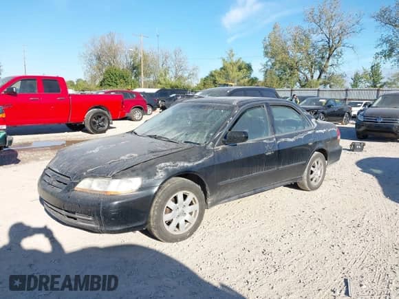 2002 Honda Accord EX with VIN 1HGCG55612A134582, listed as a IAAI auction lot 43419576 with 344,066 mi miles and . Bid and sale history available at DreamBid. Image 17.