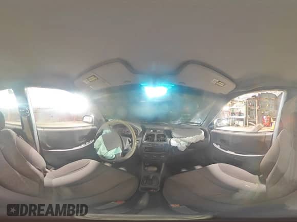 2005 Hyundai Accent GLS с VIN KMHCG45C95U632932, выставлен на аукционе Copart как лот 69448004 с пробегом Не указан миль и Списание • Salvage title. История ставок и продаж доступна на DreamBid. Изображение 13.