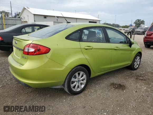 2011 Ford Fiesta SE with VIN 3FADP4BJ8BM151085, listed as a Copart auction lot 80998615 with 119,585 mi miles and Clean title. Bid and sale history available at DreamBid. Image 3.