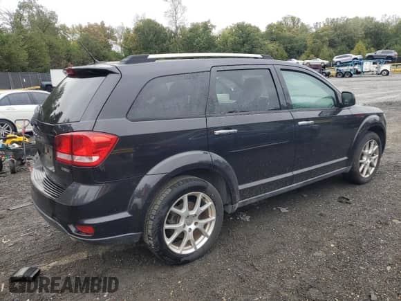 2012 Dodge Journey Crew with VIN 3C4PDCDG0CT199683, listed as a Copart auction lot 82474105 with 134,155 mi miles and Clean title. Bid and sale history available at DreamBid. Image 3.