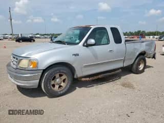 2001 Ford F-150 XL с VIN 1FTZX17271NB07728, выставлен на аукционе Copart как лот 69745895 с пробегом 178 555 миль миль и Списание • Salvage title. История ставок и продаж доступна на DreamBid. Изображение 1.