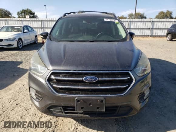 2017 Ford Escape Titanium z VIN 1FMCU9JD2HUC02846, wystawiony jako Copart lot #71730795 z przebiegiem 172 823 mil mil oraz Szkoda całkowita • Salvage title. Historia ofert i sprzedaży dostępna na DreamBid. Obrazek 5.