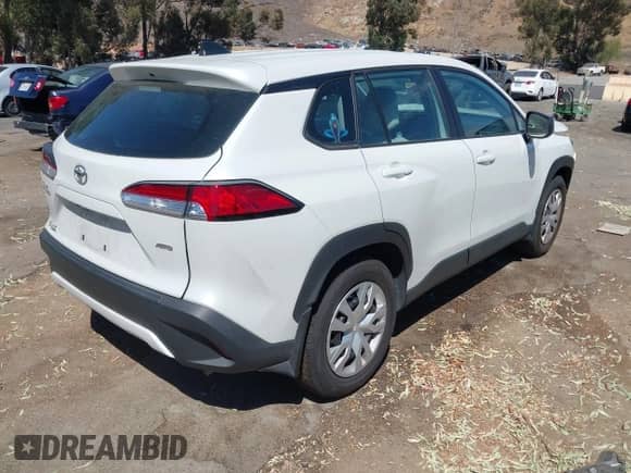 2022 Toyota Corolla Cross L with VIN 7MUAAABG8NV029483, listed as a IAAI auction lot 42687179 with 49,403 mi miles and . Bid and sale history available at DreamBid. Image 4.