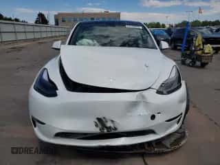 2023 Tesla Model Y Long Range with VIN 7SAYGAEE5PF592387, listed as a Copart auction lot 67555634 with 30,078 mi miles and Salvage title. Bid and sale history available at DreamBid. Image 5.