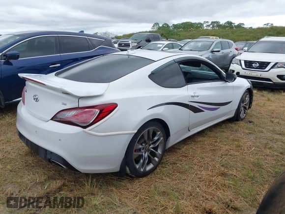 2015 Hyundai Genesis Coupe Ultimate z VIN KMHHU6KJ3FU128598, wystawiony jako IAAI lot #40511646 z przebiegiem Nie podano mil oraz . Historia ofert i sprzedaży dostępna na DreamBid. Obrazek 4.
