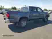 2018 Toyota Tacoma SR5 z VIN 3TMAZ5CN0JM059076, wystawiony jako Copart lot #71305965 z przebiegiem 80 502 mil mil oraz Szkoda całkowita • Salvage title. Historia ofert i sprzedaży dostępna na DreamBid. Obrazek 3.