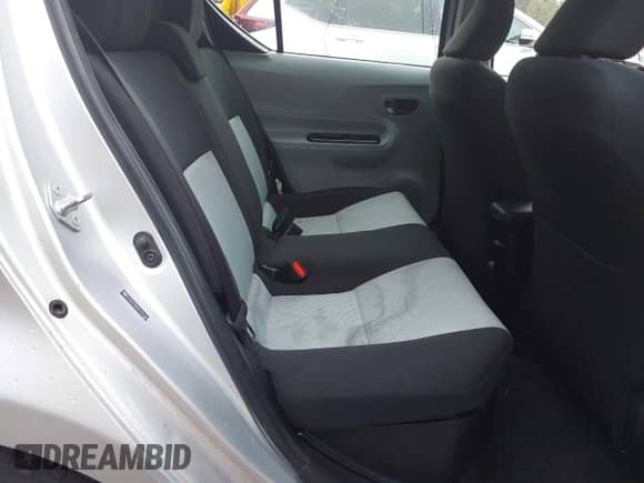 2013 Toyota Prius One z VIN JTDKDTB3XD1051060, wystawiony jako IAAI lot #42851670 z przebiegiem 163 017 mil mil oraz . Historia ofert i sprzedaży dostępna na DreamBid. Obrazek 8.