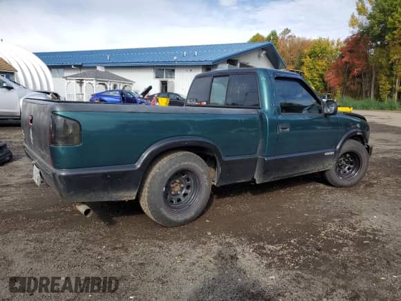 1998 Chevrolet S-10 z VIN 1GCCS1442WK134418, wystawiony jako Copart lot #86468745 z przebiegiem Nie podano mil oraz Szkoda całkowita • Salvage title. Historia ofert i sprzedaży dostępna na DreamBid. Obrazek 3.