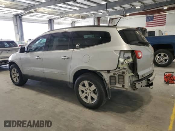 2011 Chevrolet Traverse 2LT z VIN 1GNKRJED2BJ410139, wystawiony jako Copart lot #85879085 z przebiegiem 183 266 mil mil oraz Szkoda całkowita • Salvage title. Historia ofert i sprzedaży dostępna na DreamBid. Obrazek 2.