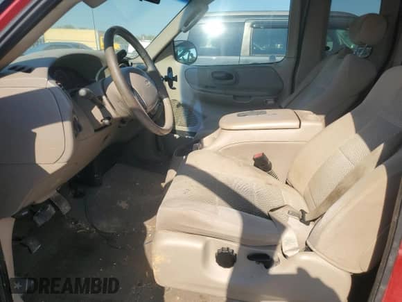 2002 Ford F-150 XL with VIN 1FTRX17282NB62755, listed as a Copart auction lot 80891255 with 171,183 mi miles and Salvage title. Bid and sale history available at DreamBid. Image 7.