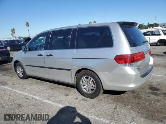 2009 Honda Odyssey LX с VIN 5FNRL38209B043354, выставлен на аукционе Copart как лот 87306645 с пробегом 226 026 миль миль и Списание • Salvage title. История ставок и продаж доступна на DreamBid. Изображение 2.