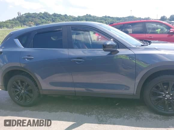 2023 Mazda CX-5 S Preferred z VIN JM3KFBCM3P0201409, wystawiony jako IAAI lot #42967658 z przebiegiem 96 983 mil mil oraz . Historia ofert i sprzedaży dostępna na DreamBid. Obrazek 13.