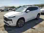 2023 Hyundai Santa Fe Calligraphy с VIN 5NMS5DALXPH584962, выставлен на аукционе Copart как лот 63695185 с пробегом 25 167 миль миль и Списание • Salvage title. История ставок и продаж доступна на DreamBid. Изображение 1.