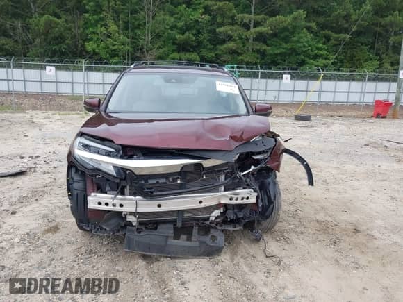 2021 Honda Pilot Touring 7-Passenger z VIN 5FNYF6H66MB062166, wystawiony jako IAAI lot #42550464 z przebiegiem 52 376 mil mil oraz . Historia ofert i sprzedaży dostępna na DreamBid. Obrazek 12.