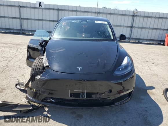2023 Tesla Model Y Long Range с VIN 7SAYGAEE3PF903721, выставлен на аукционе Copart как лот 68774815 с пробегом Не указан миль и Списание • Salvage title. История ставок и продаж доступна на DreamBid. Изображение 5.