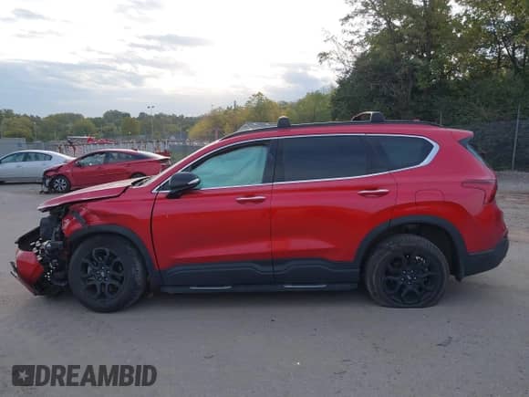 2022 Hyundai Santa Fe XRT с VIN 5NMS6DAJ9NH385619, выставлен на аукционе IAAI как лот 40580137 с пробегом 92 750 миль миль и . История ставок и продаж доступна на DreamBid. Изображение 14.