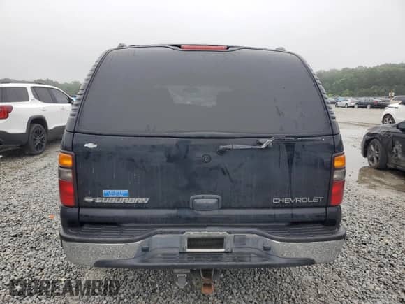 2005 Chevrolet Suburban LT with VIN 3GNFK16Z05G124893, listed as a Copart auction lot 57800115 with 245,248 mi miles and Salvage title. Bid and sale history available at DreamBid. Image 6.