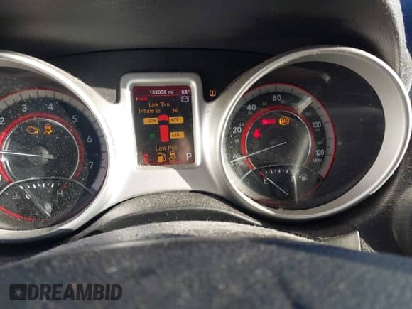 2014 Dodge Journey American Value with VIN 3C4PDCAB5ET198377, listed as a IAAI auction lot 43284974 with 182,058 mi miles and . Bid and sale history available at DreamBid. Image 7.