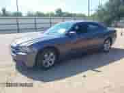 2014 Dodge Charger SXT with VIN 2C3CDXHG0EH258716, listed as a IAAI auction lot 43128720 with 155,555 mi miles and . Bid and sale history available at DreamBid. Image 17.