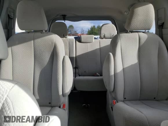 2014 Toyota Sienna LE с VIN 5TDJK3DCXES088743, выставлен на аукционе Copart как лот 49864415 с пробегом 80 125 миль миль и Списание • Salvage title. История ставок и продаж доступна на DreamBid. Изображение 10.