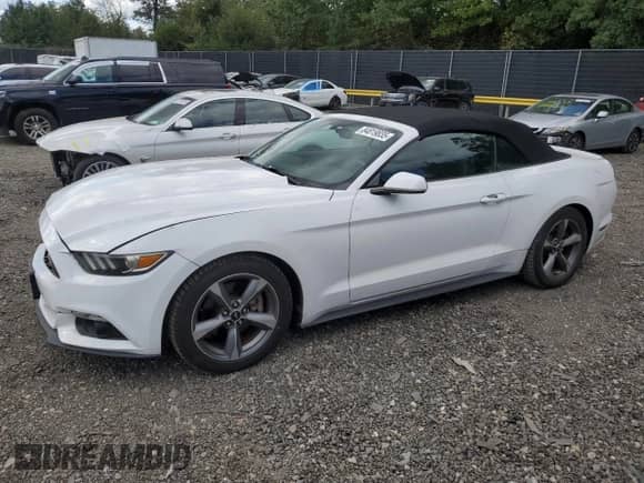 2016 Ford Mustang V6 with VIN 1FATP8EM9G5243439, listed as a Copart auction lot 84819835 with 102,883 mi miles and Salvage title. Bid and sale history available at DreamBid. Image 1.