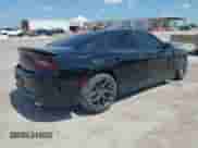 2020 Dodge Charger R/T with VIN 2C3CDXCT5LH190673, listed as a IAAI auction lot 42075997 with 85,876 mi miles and . Bid and sale history available at DreamBid. Image 4.