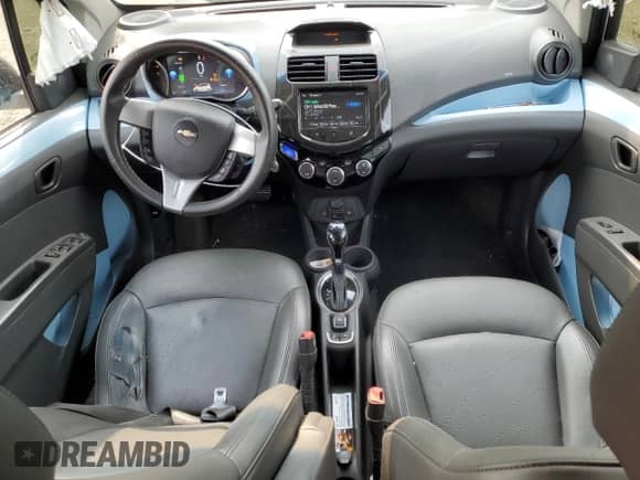 2014 Chevrolet Spark LT с VIN KL8CL6S00EC400630, выставлен на аукционе Copart как лот 67138095 с пробегом 48 631 миль миль и Списание • Salvage title. История ставок и продаж доступна на DreamBid. Изображение 8.