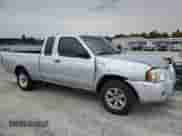 2002 Nissan Frontier XE with VIN 1N6DD26S42C319636, listed as a Copart auction lot 86513805 with 172,562 mi miles and Salvage title. Bid and sale history available at DreamBid. Image 4.