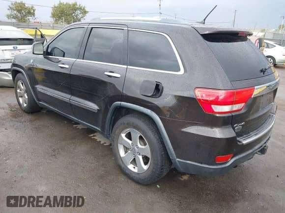 2012 Jeep Grand Cherokee Overland z VIN 1C4RJFCT2CC287745, wystawiony jako IAAI lot #43439013 z przebiegiem 153 452 mil mil oraz . Historia ofert i sprzedaży dostępna na DreamBid. Obrazek 3.