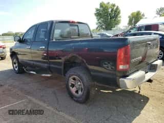 2002 Dodge RAM with VIN 3B7HU18N02G101003, listed as a Copart auction lot 77008714 with 172,690 mi miles and Clean title. Bid and sale history available at DreamBid. Image 2.