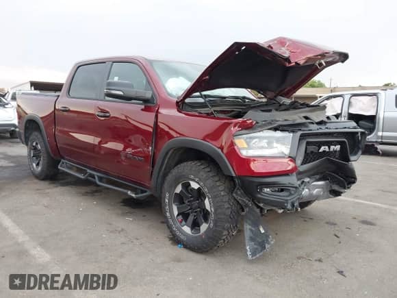 2024 Ram 1500 Rebel z VIN 1C6SRFLT5RN211645, wystawiony jako IAAI lot #43118716 z przebiegiem 17 951 mil mil oraz . Historia ofert i sprzedaży dostępna na DreamBid. Obrazek 1.