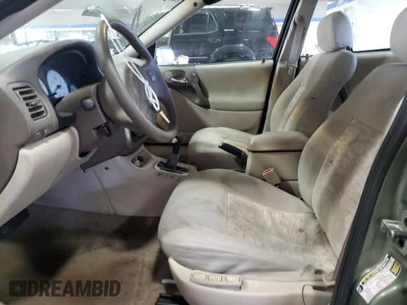 2004 Saturn L L300 2 with VIN 1G8JD54RX4Y520917, listed as a Copart auction lot 88127805 with 70,549 mi miles and Salvage title. Bid and sale history available at DreamBid. Image 7.