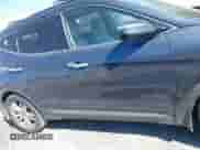 2014 Hyundai Santa Fe with VIN 5XYZU3LA0EG175108, listed as a IAAI auction lot 43118545 with 138,679 mi miles and . Bid and sale history available at DreamBid. Image 13.