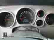 2012 Toyota Tundra Limited with VIN 5TFHY5F13CX241054, listed as a Copart auction lot 90242605 with 122,532 mi miles and Salvage title. Bid and sale history available at DreamBid. Image 9.