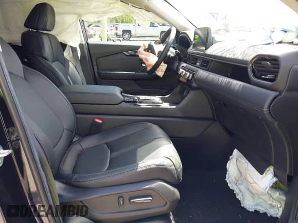 2024 Honda Pilot EX-L with VIN 5FNYG2H49RB014141, listed as a IAAI auction lot 42013162 with 13,351 mi miles and . Bid and sale history available at DreamBid. Image 5.