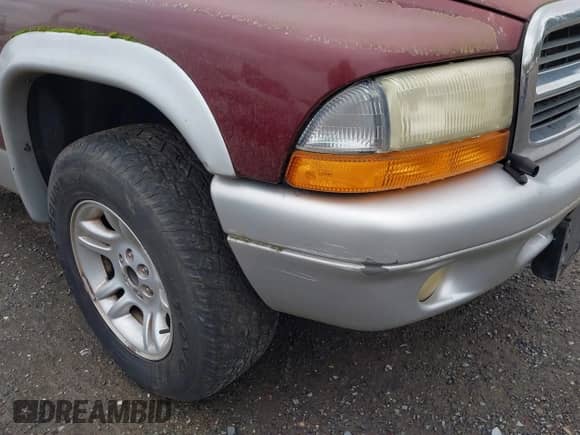 2002 Dodge Dakota SLT z VIN 1B7HL48N02S620775, wystawiony jako IAAI lot #42128828 z przebiegiem 79 248 mil mil oraz . Historia ofert i sprzedaży dostępna na DreamBid. Obrazek 6.